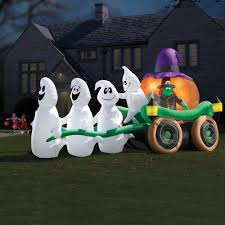 The happy halloween sign features a blinking pumpkin and spooky ghosts. Spooktacular Fun With Halloween Inflatable Decorations The Lone Girl In A Crowd