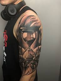 Broken Hourglass With Holding Hands Tattoos For Guys Hourglass Tattoo Arm Tattoos For Guys