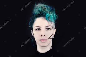 Again, keep in mind that this type of hair cut is very high maintenance and implies frequent haircuts and lots of product. Rock Or Punk Hairstyles On A Black Background Portrait Of A Girl With Crazy Hair In Colorful Shades 183982814 Larastock