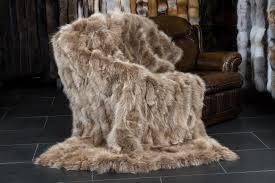 Surround yourself in soft, luxurious fur. Canadian Coyote Real Fur Throw Brown Beige Lars Paustian