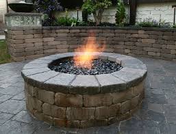 Build a simple firepit in a weekend and add ambience to your backyard. Outdoor Fire Pits Fire Pit With Retaining Wall Blocks Brick Fire Pit Fire Pit Kit Fire Pit