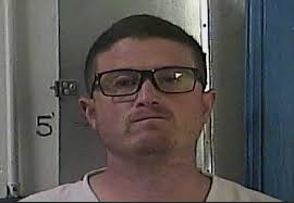 NPD officer charged with domestic assault, false imprisonment