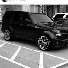 Jayespinoza5 S Nitro Sitting Pretty And Rolling On Replicas Wrapped In Nittotire 420s With Retrofitted Headlights By Traphousecu Dodge Nitro Dodge Suv Nitro