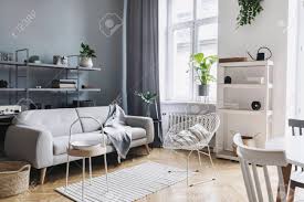 Fortunately, there are things you can get rid of to free up some space and make your room feel more inviting. Stylish Home Nordic Living Room With Design Sofa Family Table Stock Photo Picture And Royalty Free Image Image 119076919