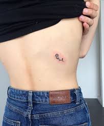 Some ideas include a tiny heart, an arrow, a smile, or word. Pinterest Danijennner Small Rose Tattoo Tattoos Rose Tattoos