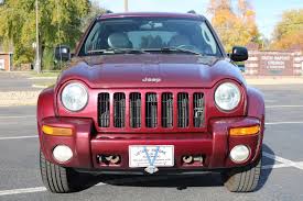 Image result for Flame Red 2003 Jeep