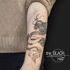 Dragon Tattoo On Arm Fine Lines Dragon Tattoo Dragon Tattoo Arm Tattoos