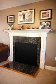 Or just keep an open spot above your mantel and display the cover there while you're using your fireplace. Insulated Magnetic Decorative Fireplace Cover Fireplace Fashion