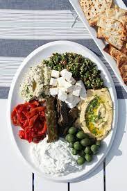 We're talking about grilled chicken marinated in tahini, herby lamb meatballs with yogurt, bright cucumber and tomato salads, meaty stuffed eggplant, and so much more. Mediterranean Dinner Party Menu Popsugar Middle East Food