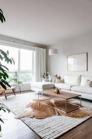 By keeping the various seating heights at about the same eye level, the space is inviting and the sight lines are open. Designing My Modern And Minimalist Living Room With Havenly Downshiftology