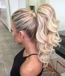 Curly Blonde Ponytail With Hair Wrap High Ponytail Hairstyles Ponytail Hairstyles Medium Hair Styles