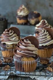 The Ultimate Reese S Cupcake With Swirled Chocolate Peanut Butter Cake And Swirled Chocolate Peanut Homemade Cupcake Recipes Gourmet Cupcakes Cupcake Recipes
