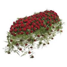 This design is usually the main tribute and can include favourite flowers or colours of the family or be themed. Luxury Red Rose Casket Spray Roots And Shoots Florist Richmond North Yorkshire