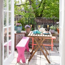 Create a vertical garden on an old wooden ladder to spice up your balcony space: Balcony Garden Ideas Transform Tiny Spaces Into Mini Horticultural Havens