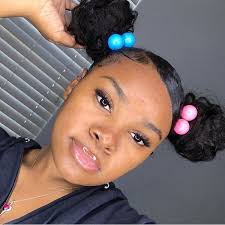 The small coils are super cute. Pin On Bun Hairstyles Bun Hairstyle Ideas For Curly Natural Hair