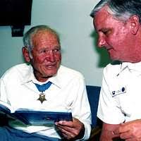 US Navy 071108-N-2893B-002 Boatswain's Mate 1st Class Aaron Haney gives a  tour of USS Constitution to Medal of Honor recipient retired Navy Lt. John  Finn. At 98 years old, Finn is the