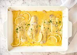 Baked Fish With Lemon Cream Sauce Recipe Baked Fish Fish Recipes Lemon Cream Sauces