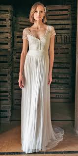 27 Awesome Simple Wedding Dresses For Cute Brides Wedding Dresses Guide Short Sleeve Wedding Dress Wedding Dresses Simple Embellished Wedding Dress