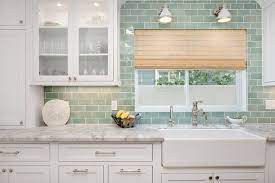 These Beachy Kitchen Ideas Will Help You Prolong Summer Farmhouse Sink Kitchen Green Backsplash Kitchen Remodel