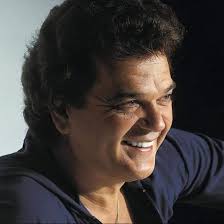 This day 1993...Country singer Conway Twitty died from an abdominal aortic  aneurysm. He had the 1958 US & UK #1 single "It's Only Make Believe". Until  2000, he held the record for