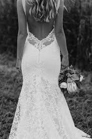 Lace Wedding Dress We Are In Love With This Low Back Dress Accented With Lace Made With Love B Bohemian Wedding Dresses Wedding Gowns Online Wedding Dresses
