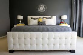 A yellow and grey bedroom for a little boy, featuring a house bed, book ledges, mouse table and chairs a yellow and grey room for finn. A Trendy Color Combo Grey And Yellow Perfect For Both Bold And Serene Interiors