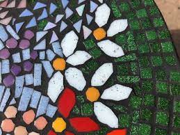 Now that you have adhered your tiles to your mosaic base, it is time to grout your piece. Cleaning Grout From Pits In Vitreous Tile How To Mosaic