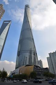 Wuhan greenland center's uniquely streamlined form combines three key formal concepts—tapered body, softly rounded corners, and domed top—that reduce the wind resistance that builds up around supertall towers. Shanghai Tower Wikipedia
