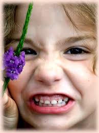 girl with purple flower