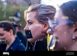 New York, USA. 8th Apr, 2022. Silent protest against Ukraine Russian Rapes.  Women and children gathered as flash mob in Washington Square Park NYC. to  show their outrage and condem Putin's army