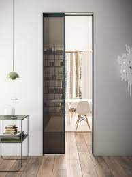 Porta Scorrevole Interno Muro In Alluminio Grigio Ferro E Vetro Fume Stipite Raso Con Effetto Filomuro Design Per Porte Porte Vetro Scorrevoli Porte Vetro