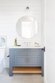 Newport Island Beach House Bathroom Shiplap Wall Gold Circle Vanity Mirror Blue Bathroom Vanity In 2020 Beach House Interior House Bathroom Beach House Bathroom