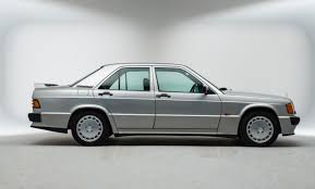 Fabulous almandine red metallic with black leather. Mercedes 190 Cosworth 2 5 16v