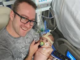 Dad's joy as baby boy gets a new heart