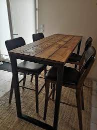 mange debout en bois et ossature metallique recouverte par une peinture noire dimensions du modele sur la photo in 2021 rustic dining table wood and metal home decor