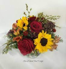 Rose Lily And Sunflower Arrangement Rose Of Sharon Floral Designs Rose Of Sharon Rose Centerpieces Sunflowers And Roses