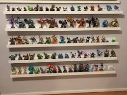 Ikea Picture Ledges To Hold Skylanders And Disney Infinity Characters Play Therapy Room Playroom Design Kids Play Spaces