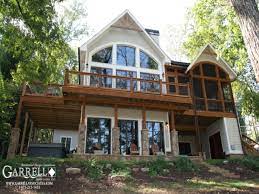 Living areas, as well as the master suite, offer lake views for the homeowner. Small Lakefront Cottage Plans House Plans Small Lake Lake House Plans With Basement Lake Cottage Basement House Plans New House Plans Cottage House Plans