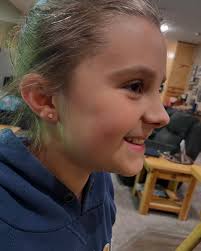 Sweet Jovie got her ears pierced this past weekend to celebrate the start  of the summer. She's excited to show of her new pink enamel 💖s.  #earpiercingbynurses #earpiercingbymegan #earpiercing #safeearpiercing  #earrings #earpiercinginspiration #