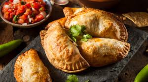 A Deliciously Epic Battle: Who Makes the Best Empanadas, Argentina or  Colombia?