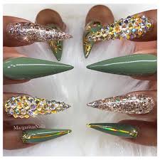 Young girls can have fun with press on nails that can be bright colors, patterned, and even change colors in sunlight. Olive Green Stiletto Nails New Expression Nails