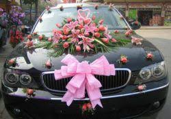 Car Decoration For Wedding Using A Black Car Decorated With Pink Ribbons And Trimmings Plus Flower Wedding Car Decorations Wedding Getaway Car Wedding Limo