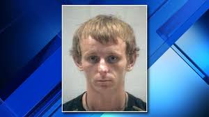 Man steals vehicle, credit cards, breaks into cars, pulls knife