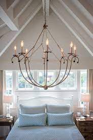 Beach House With Airy Coastal Interiors Home Bunch An Interior Design Luxury Homes Blog Master Bedroom Chandelier Chandelier Bedroom Luxurious Bedrooms