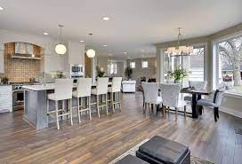 No longer created solely for the preparation and serving of food, kitchens have been opened and merged with other rooms, particularly the living space. Open Plan Kitchen Living Room Flooring Novocom Top