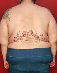 Egptian female anubis tattoos designs. Tattoo Artist Develops Flower Roll Tattoos Specifically For Fat Bodies See Photos Allure