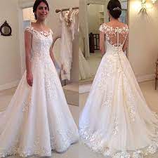 Wie viel kostet unsere langen brautkleider? Zarte Spitze Brautkleider Kappen Hulsen Perlen Appliques A Line Brautkleid Bezogene Knopfe Bodenlangen Sexy Hochzeitskleid Wedding Gowns Sexy Wedding Gownswedding Dress Cap Sleeve Aliexpress