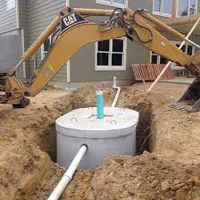 Owning a home with a septic tank doesn't have to be scary. Septic System Installation With Photos Small Home Big Decisions Mother Earth News Diy Septic System Septic System Installation Septic Tank Systems