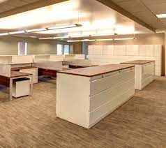 The storage cabinet with doors offers a convenient way to keep books, personal items, and supplies organized in any home office or living space. Around The Modern Office One Office Item Everyone Underestimates Modern Office Furniture