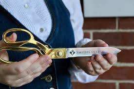 Haynes House President Sophia Mustone '26, along with Vice President for  Equity and Inclusion Floyd Cheung, cut a ceremonial ribbon to honor a new  plaque